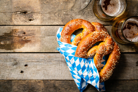Oktoberfest Concept Pretzels And Beer On Rustic Wood Background